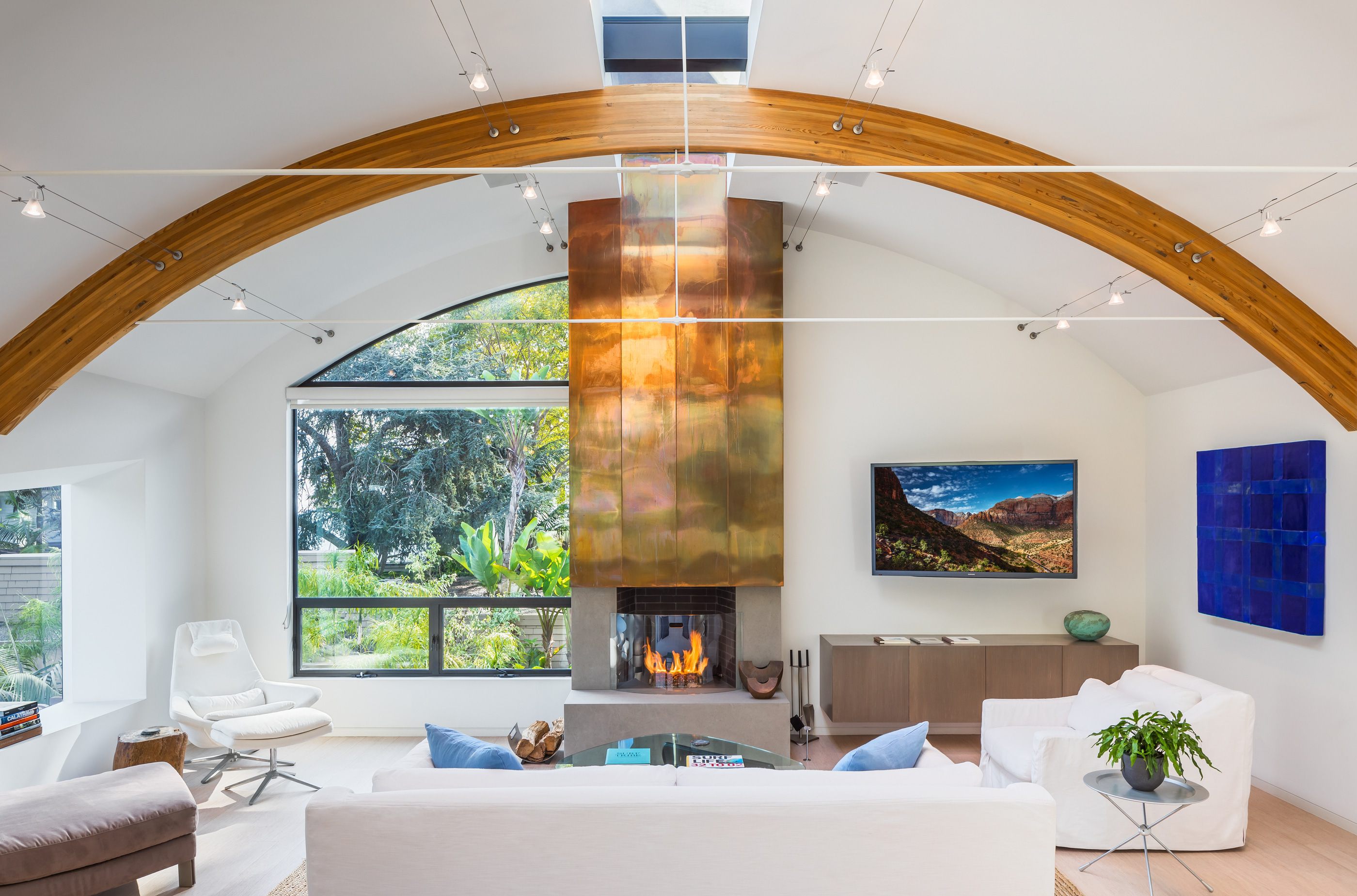 Handtmann-Guesthouse-Copper-Fireplace-Glulam-Ceiling-Beam