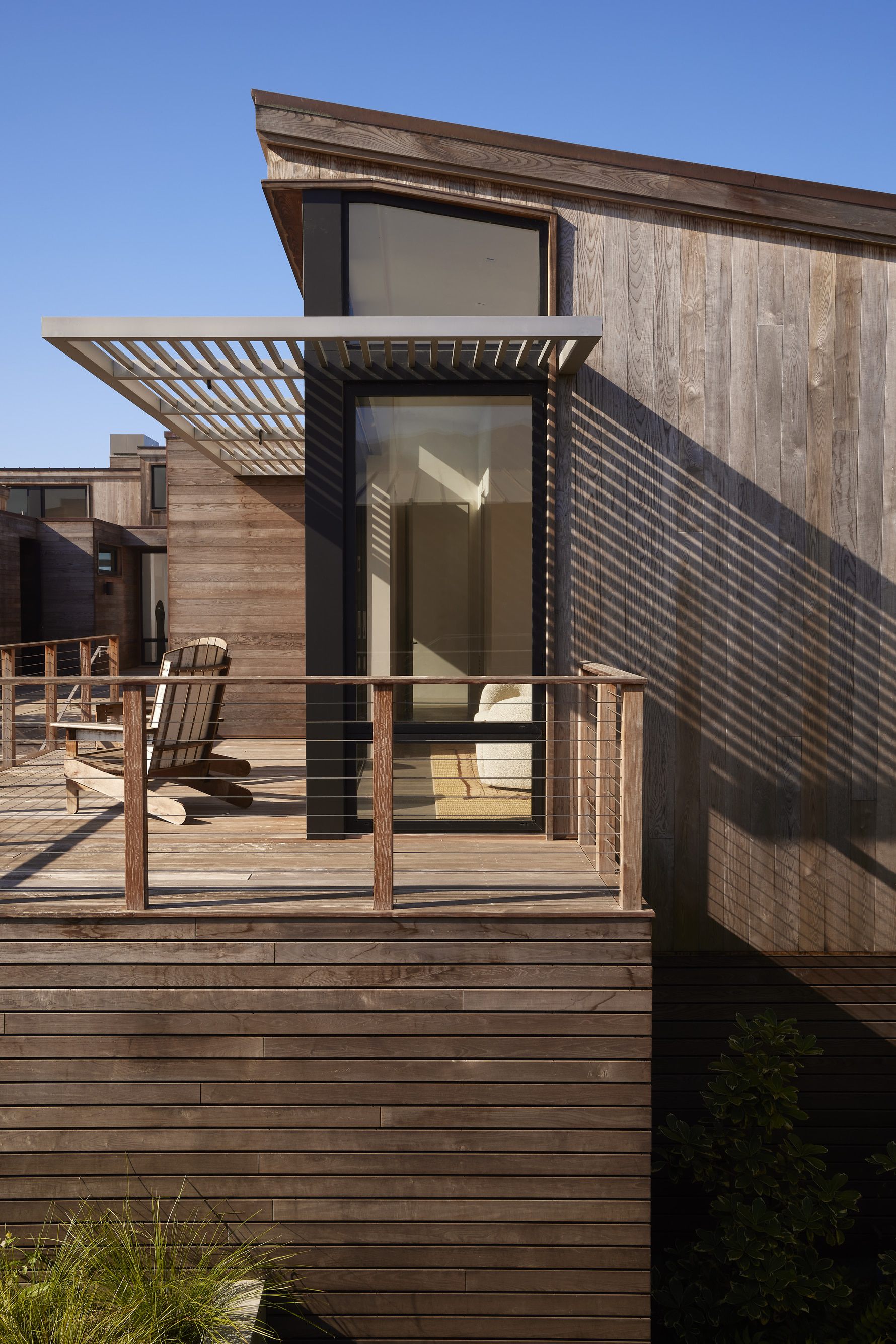 El-Estero-Beach-House-Wood-Siding-Metal-Trellis