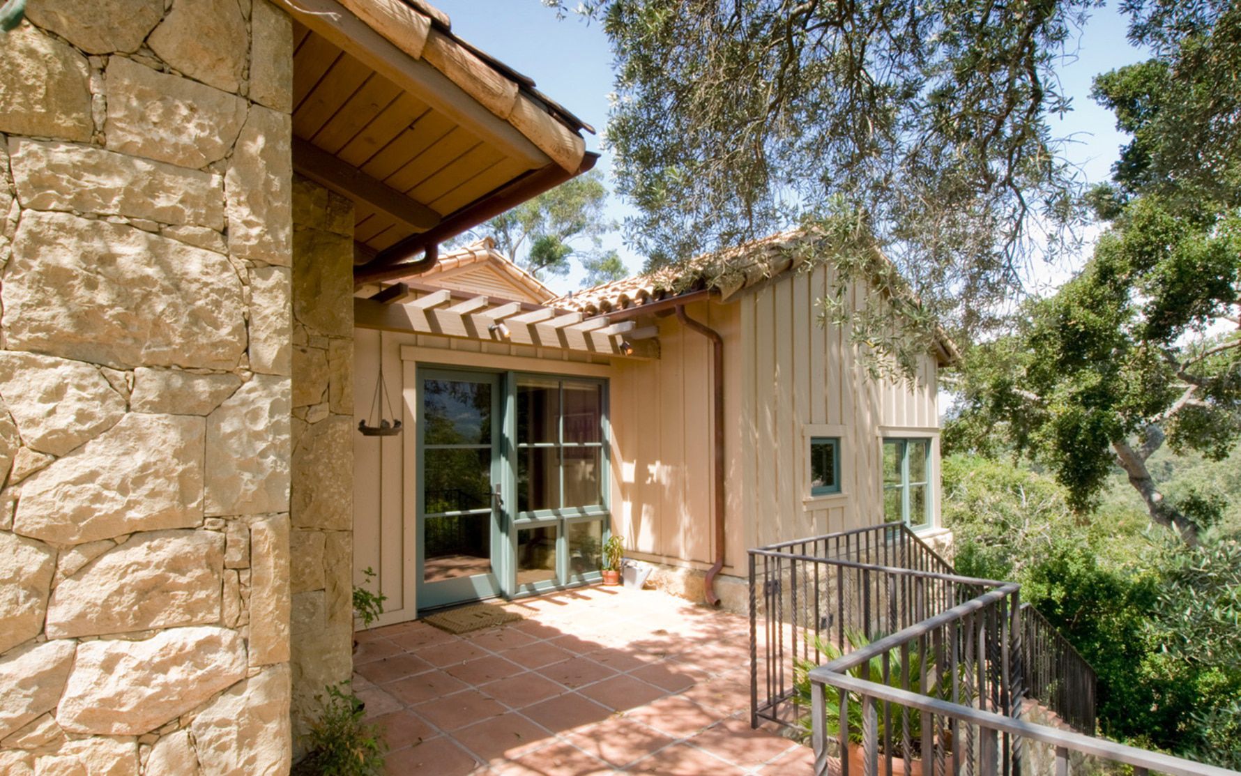 Hedrick-Residence-Stone-Walls-Board-and-Batt-Wood-Siding