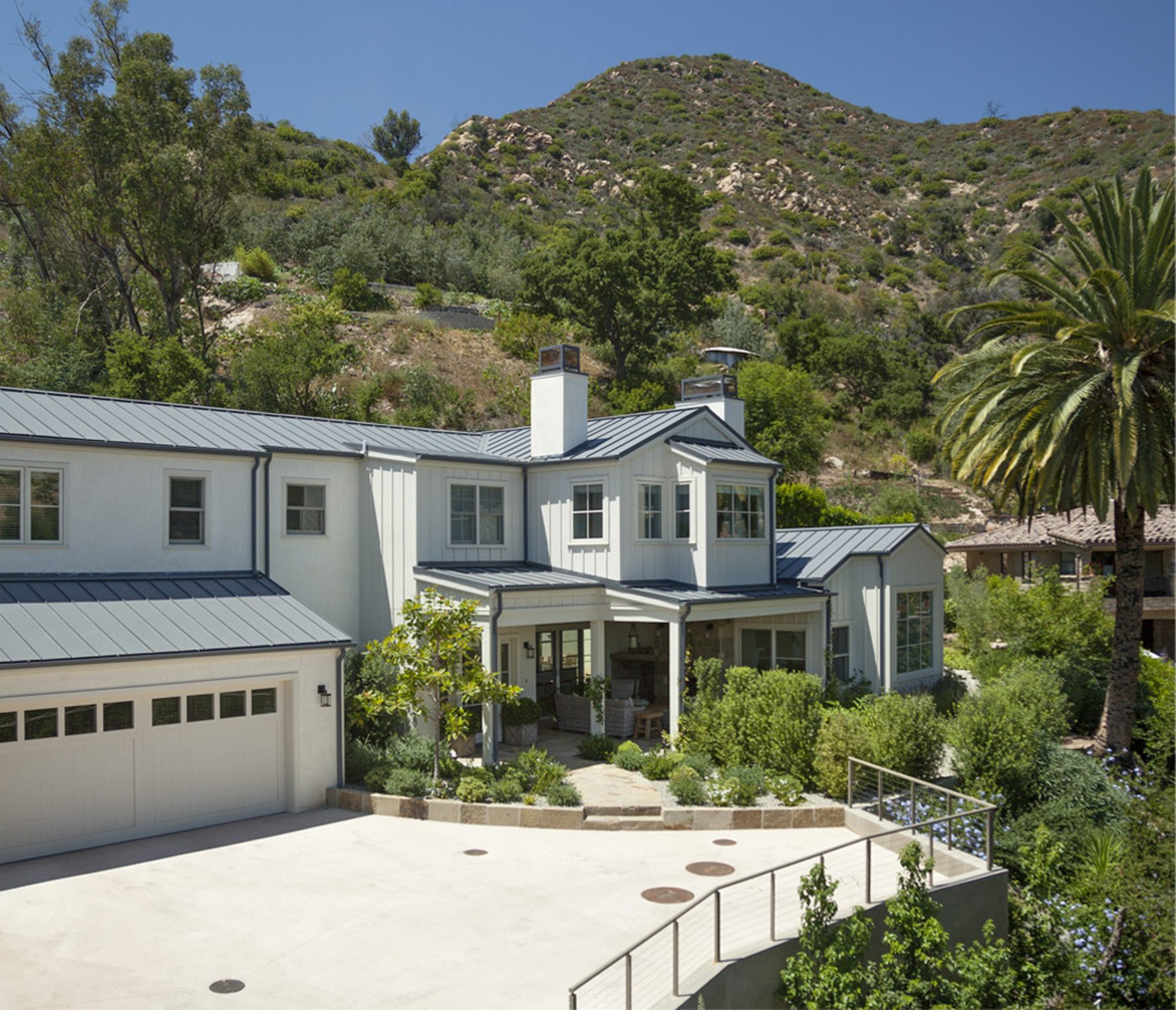 East-Mountain-Residence-Metal-Roof-Board-and-Batt-Wood-Siding